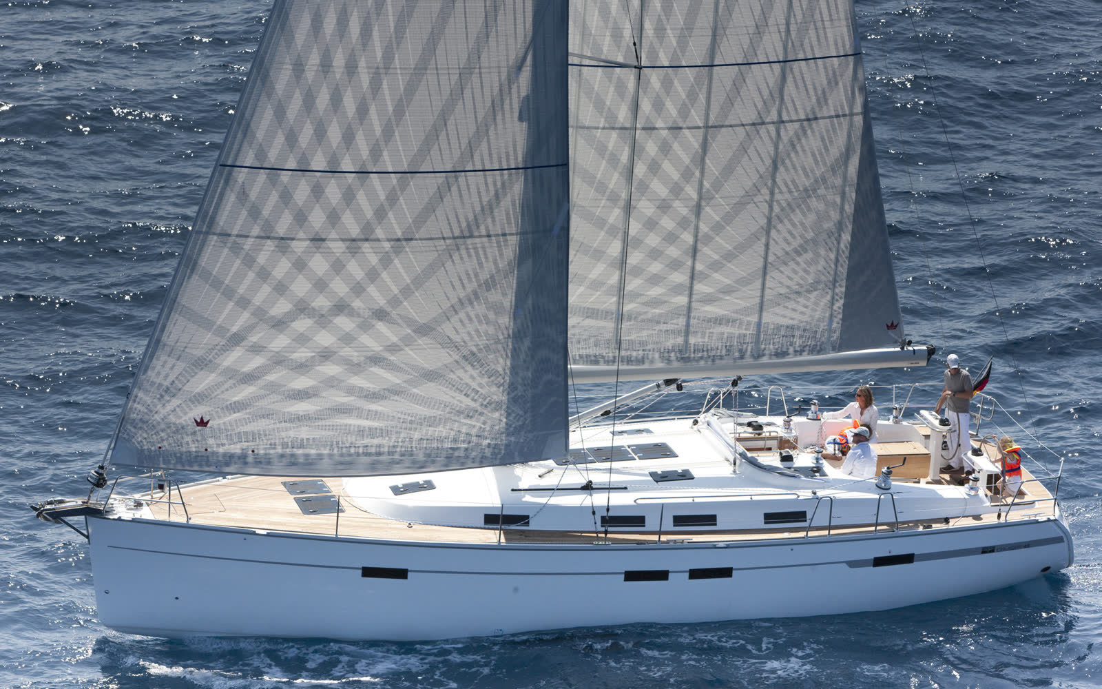 A Bavaria Cruiser 45 sailing on open blue water